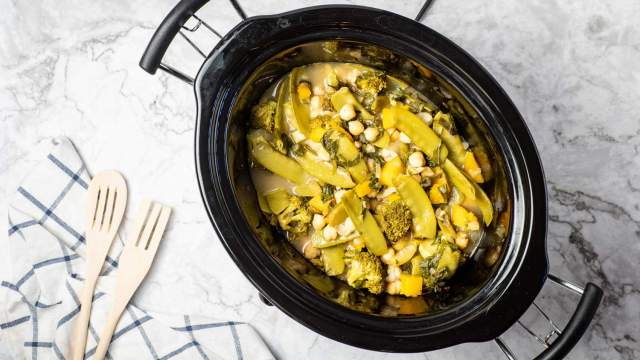 Slow cooker curry chickpeas and vegetables in a crockpot.