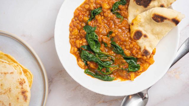 Slow cooker Madras Lentils with lentils, potatoes, and spinach in a creamy coconut sauce.