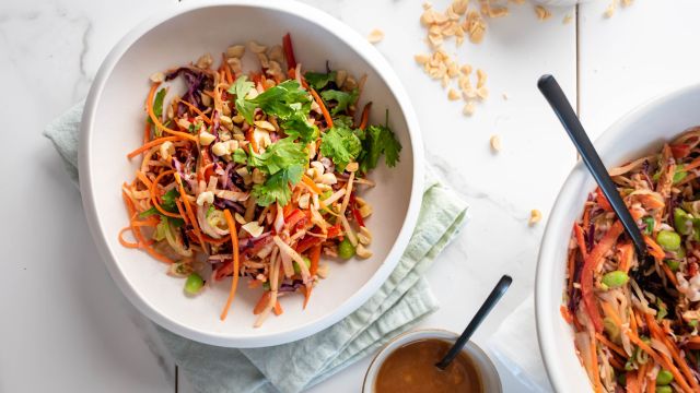 Asian peanut slaw with cabbage, jicama, carrots, cilantro, and edamame tossed in a peanut dressing.