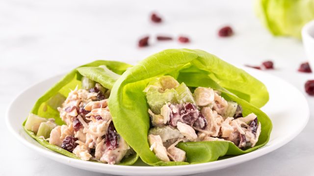 Chicken salad lettuce wraps with homemade cranberry and celery chicken salad wrapped in a butter lettuce leaf.