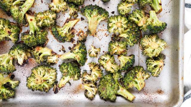 Roasted Asian broccoli cooked until the edges brown with soy sauce, sesame sauce, rice vinegar, and ginger.