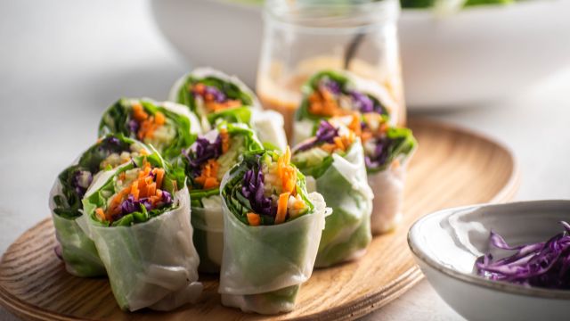 Fresh spring roll with tofu, cold noodles, and vegetables with peanut sauce.