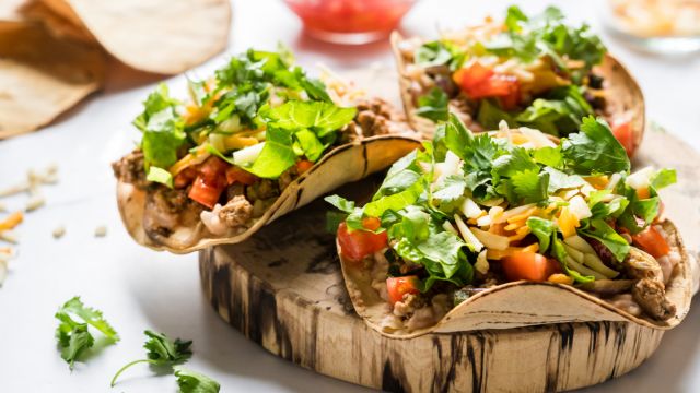 Turkey poblano tostadas with ground turkey, poblano peppers, and onions served on baked corn tortillas.