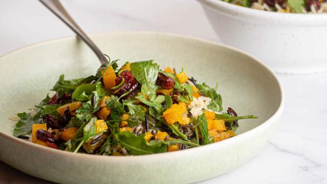 Wild rice salad with acorn squash, cranberries, arugula, and a lemon dressing.